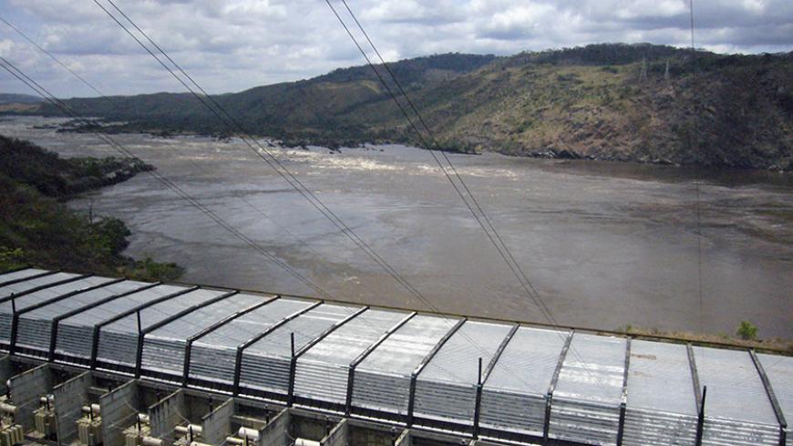 An ariel view of the semi-functional Inga dam on the Congo River October 22, 2006. With a flow second only to the Amazon, the mighty Congo river spews forth 1.5 million cubic feet (42.5 million litres) into the Atlantic every second. Experts say it could generate over 40,000 megawatts (MW) of electricity -- more than twice the projected capacity of China 's massive Three Gorges Dam, and a major step to keeping up with fast-growing demand for electricity in Africa and beyond. Picture taken October 22, 2006. 