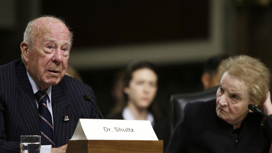 Former United States Secretaries of State George Shultz (L) and Madeleine Albright testify at the Senate Armed Services Committee on global challenges and U.S. national security strategy on Capitol Hill in Washington January 29, 2015.   REUTERS/Gary Cameron   (UNITED STATES - Tags: POLITICS) - RTR4NHNC