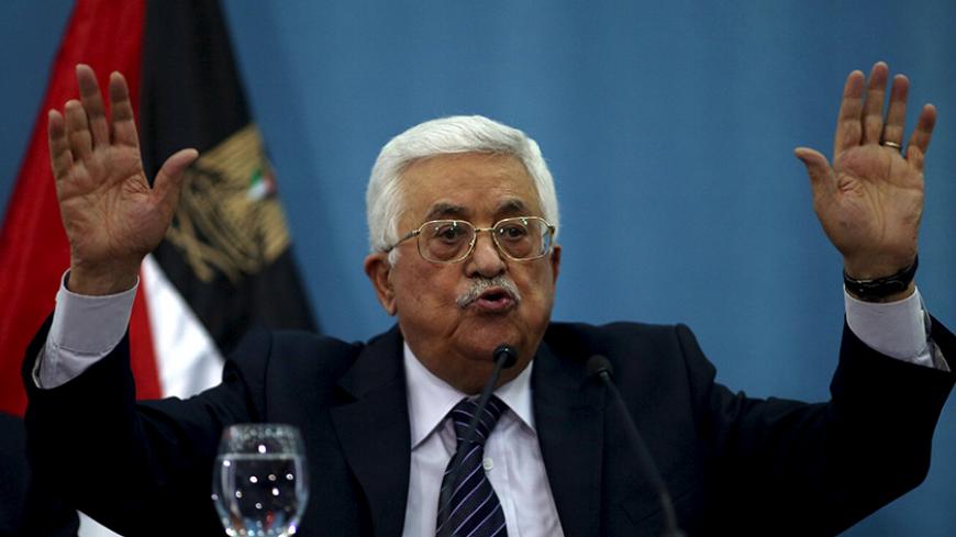 Palestinian President Mahmoud Abbas gestures as he speaks to the media in the West Bank city of Ramallah January 23, 2016. REUTERS/Mohamad Torokman   - RTX23PR4