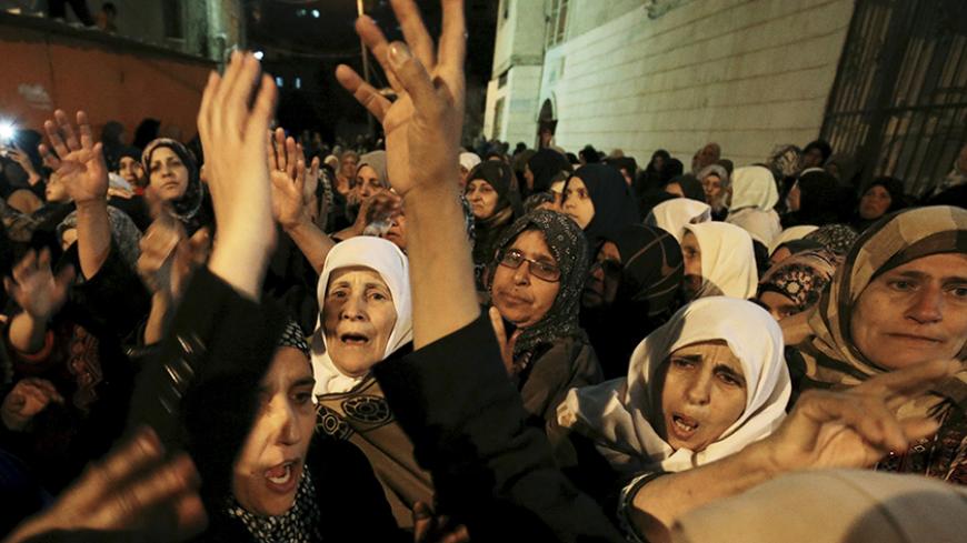 Women mourn during the funeral of Palestinian Ahmed Zakarna in the West Bank town of Qabatya, near Jenin February 5, 2016. Zakarna and two other Palestinians armed with guns, knives and explosives killed an Israeli border policewoman and seriously wounded another before being shot dead by nearby officers at an entrance to Jerusalem's walled Old City on Wednesday, Israeli police said. REUTERS/Mohamad Torokman - RTX25N6L