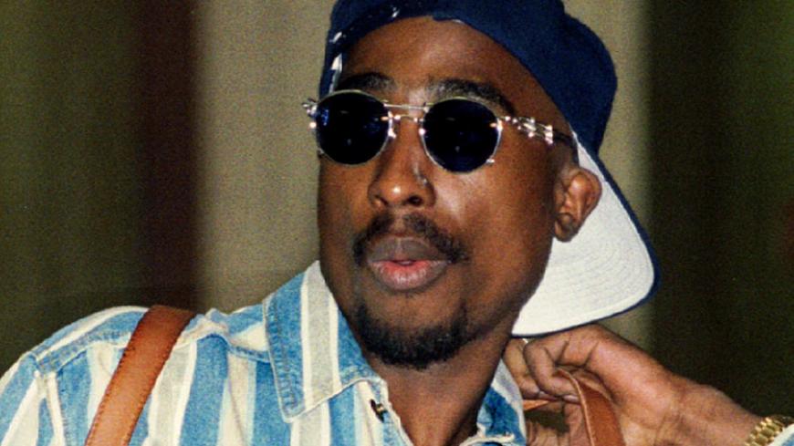 Rap singer and actor Tupac Shakur is shown as he arrives for a court hearing on weapon possession charges September 27 at the Criminal Courts Building in Los Angeles - RTXF80D