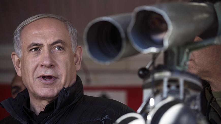 Israel's Prime Minister Benjamin Netanyahu visits a military outpost on Mount Hermon in the Golan Heights over looking the Israel-Syria border February 4, 2015. REUTERS/Baz Ratner (ISRAEL - Tags: POLITICS CIVIL UNREST CONFLICT) - RTR4O8P8