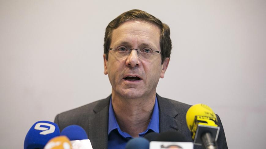 Isaac Herzog, co-leader of Zionist Union with Tzipi Livni, delivers a statement at the party headquarters in Tel Aviv March 18, 2015. Israeli Prime Minster Benjamin Netanyahu pledged on Wednesday to form a new governing coalition quickly after an upset election victory that was built on a shift to the right and is likely to worsen a troubled relationship with the White House. With nearly all votes counted on Wednesday, Netanyahu's Likud had won 30 seats in the 120-member Knesset, comfortably defeating the c