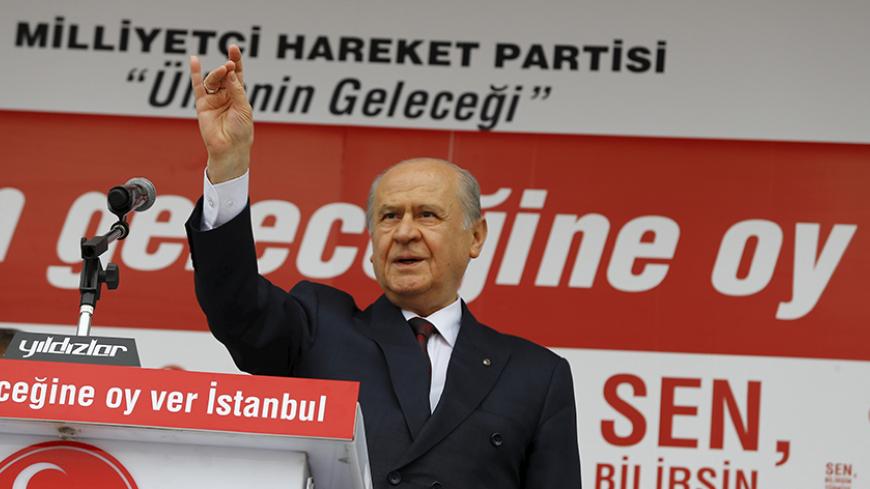 Nationalist Movement Party (MHP) leader Devlet Bahceli makes the grey wolf sign of the party during an election rally for Turkey's general election on November 1, in Istanbul, Turkey October 18, 2015.  REUTERS/Osman Orsal - RTS4Z00