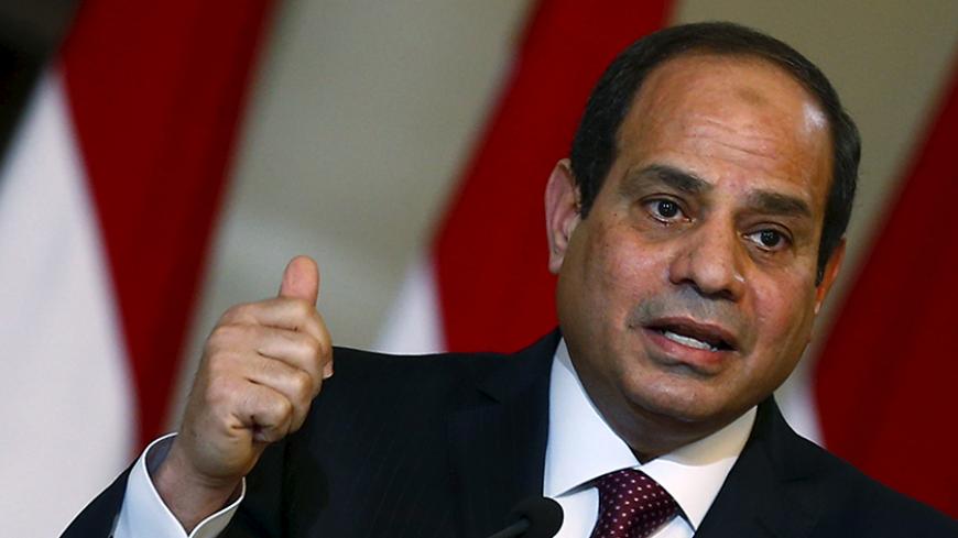 Egypt's President Abdel Fattah al-Sisi speaks to the media after the signing ceremony for a deal to build Egypt's first nuclear power plant between Egypt and Russia at the Ittihadiya presidential palace in Cairo, Egypt, November 19, 2015. Moscow and Cairo signed an agreement on Thursday for Russia to build a nuclear power plant in Egypt, with Russia extending a loan to Egypt to cover the cost of construction. REUTERS/Amr Abdallah Dalsh - RTS800T