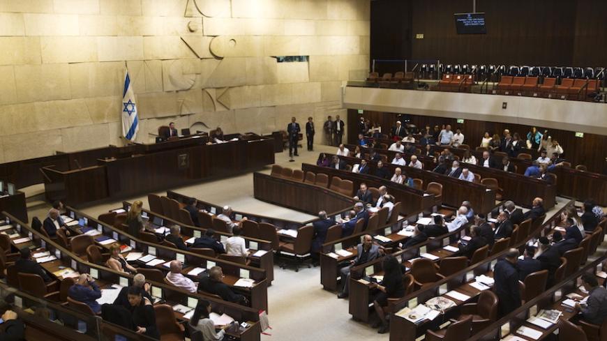 A general view shows the plenum during a session at the Knesset, the Israeli parliament, in Jerusalem May 13, 2015. Netanyahu's emerging government scraped by its first parliamentary test on Wednesday, paving the way for the new cabinet to be sworn in after two months of difficult coalition building. REUTERS/Ronen Zvulun  - RTX1CSJJ