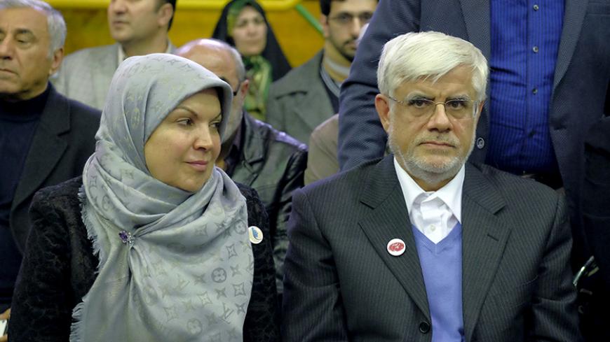 Iranian former vice-president Mohammad Reza Aref and his wife Hamideh Moravvej Farshi attend a reformist campaign for upcoming parliamentary election, in Tehran February 18, 2016. REUTERS/Raheb Homavandi/TIMA  ATTENTION EDITORS - THIS IMAGE WAS PROVIDED BY A THIRD PARTY. FOR EDITORIAL USE ONLY.    - RTX27KDQ