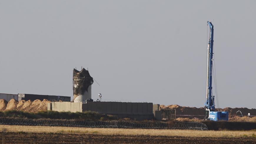 A drill is seen on the Israeli side of the Southern Gaza border where, according to the Israeli army, a tunnel was discovered, Israel, April 18, 2016. REUTERS/Amir Cohen - RTX2AIZN