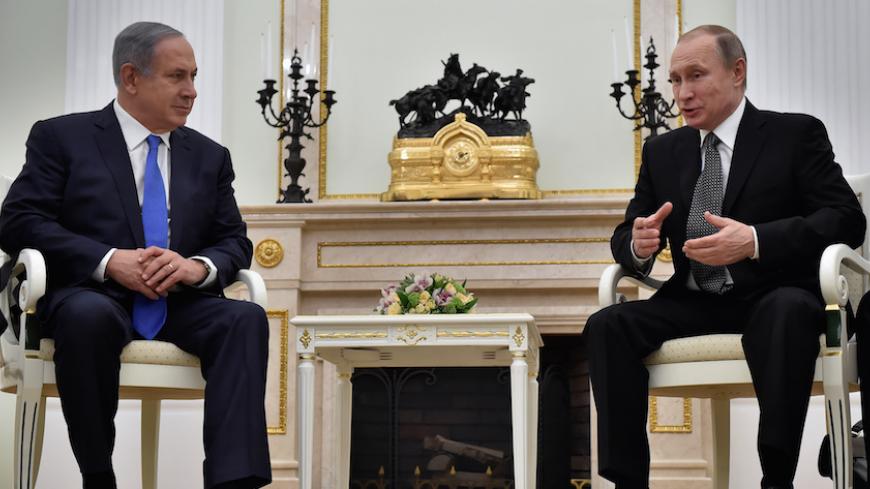 Russian President Vladimir Putin (R) meets with Israeli Prime Minister Benjamin Netanyahu at the Kremlin in Moscow, Russia, April 21, 2016. REUTERS/Alexander Nemenov/Pool - RTX2B0C8