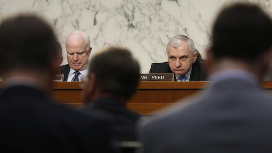 Senate Armed Services Committee Chairman John McCain (R-AZ) (2ndL) and ranking member Senator Jack Reed (D-RI) (2ndR) listen to testimony by U.S. Secretary of Defense Ash Carter (C) about operations against the Islamic State, on Capitol Hill in Washington, U.S., April 28, 2016. REUTERS/Jonathan Ernst - RTX2C2J5