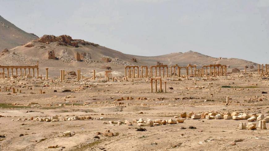 A general view shows the historic city of Palmyra, in Homs Governorate in this file handout picture provided by SANA on March 27, 2016. REUTERS/SANA/Handout via Reuters/Files  ATTENTION EDITORS - THIS PICTURE WAS PROVIDED BY A THIRD PARTY. REUTERS IS UNABLE TO INDEPENDENTLY VERIFY THE AUTHENTICITY, CONTENT, LOCATION OR DATE OF THIS IMAGE. FOR EDITORIAL USE ONLY. NOT FOR SALE FOR MARKETING OR ADVERTISING CAMPAIGNS. THIS PICTURE IS DISTRIBUTED EXACTLY AS RECEIVED BY REUTERS, AS A SERVICE TO CLIENTS - RTSD10L