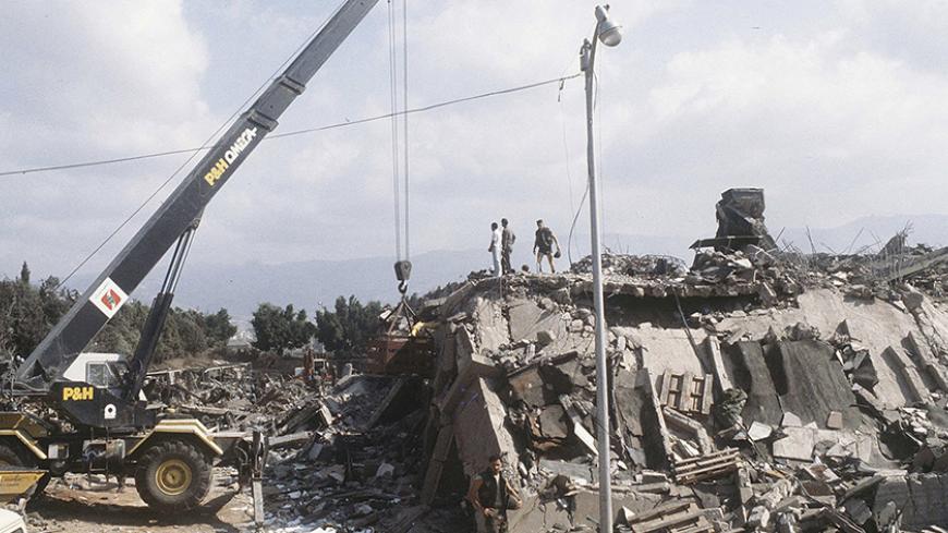 A crane is brought in after the explosion of the Marine Corps building in Beirut, Lebanon October 23, 1983. The U.S. Supreme Court on Wednesday ruled that almost $2 billion in frozen Iranian assets must be turned over to American families of people killed in the 1983 bombing of a U.S. Marine Corps barracks in Beirut and other attacks blamed on Iran.  REUTERS/US Marines/Handout via REUTERS   ATTENTION EDITORS - FOR EDITORIAL USE ONLY. NOT FOR SALE FOR MARKETING OR ADVERTISING CAMPAIGNS. THIS PICTURE WAS PROV