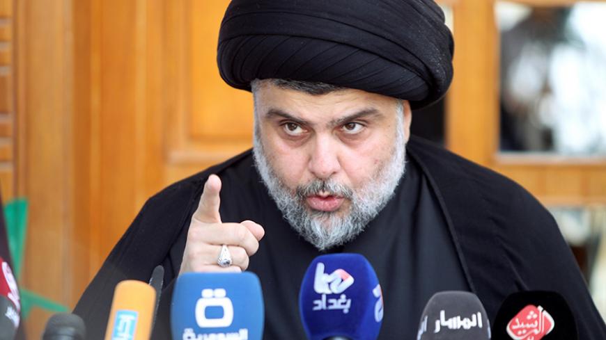 Iraqi Shi'ite cleric Moqtada al-Sadr speaks during a news conference in Najaf, south of Baghdad, Iraq April 30, 2016. REUTERS/Alaa Al-Marjani    - RTX2C8B9