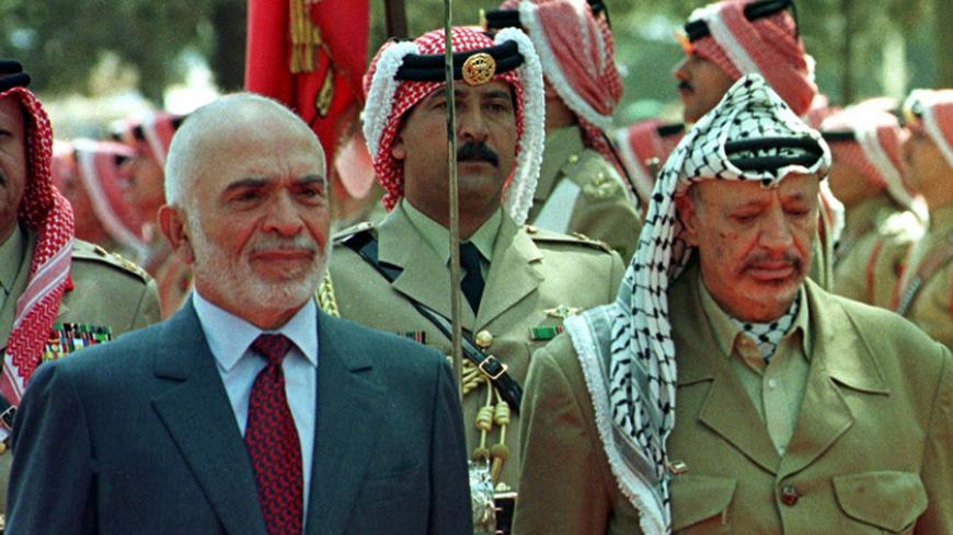 Jordan's King Hussein (L) and Palestinian President Yasser Arafat review a bedouin guard of hounour on his arrival at the Royal Court in Amman October 2. Arafat arrived in Jordan on Thursday to visit the freed founder of the Islamic militant movement Hamas Sheikh Ahmed Yassein.

MIDEAST YASSEIN - RTR7BVT