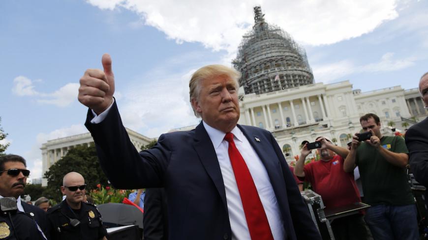 Republican presidential candidate Donald Trump arrives at a Capitol Hill rally to "Stop the Iran Nuclear Deal" in Washington September 9, 2015. REUTERS/Jonathan Ernst  - RTSCYY