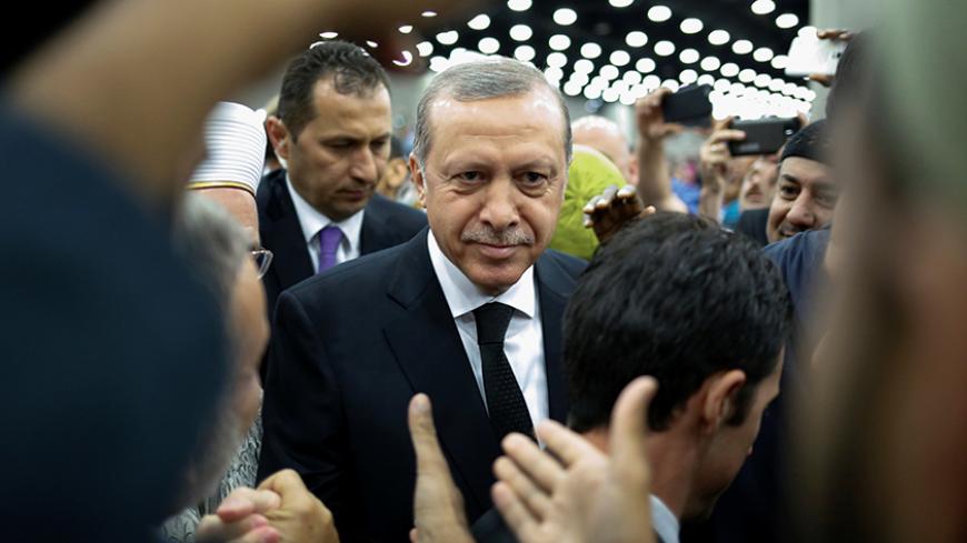 Turkish President Tayyip Erdogan arrives to take part in the jenazah, an Islamic funeral prayer, for the late boxing champion Muhammad Ali in Louisville, Kentucky, U.S. June 9, 2016.  REUTERS/Adrees Latif - RTSGS76