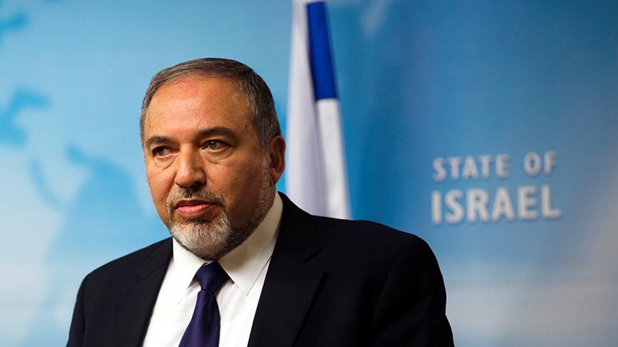 Israel's former Foreign Minister Avigdor Lieberman gives a statement to the media at his Jerusalem office December 2, 2014. REUTERS/ Ronen Zvulun/File Photo - RTX2ETJI