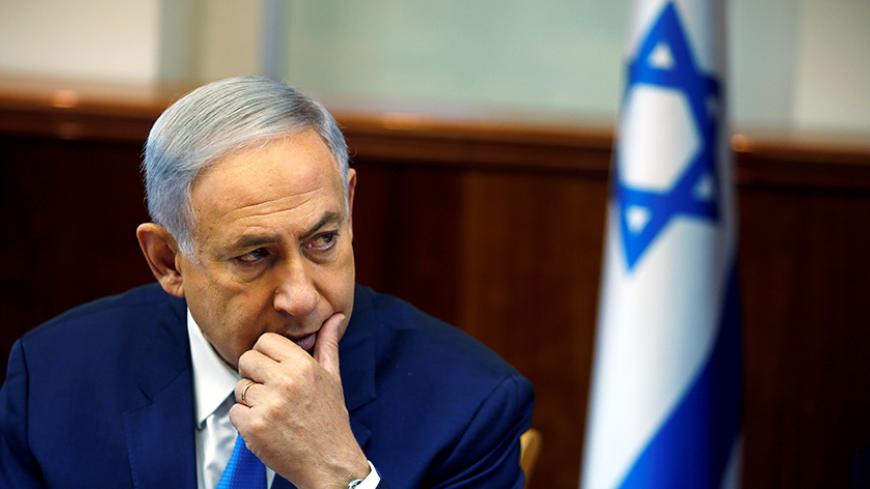 Israeli Prime Minister Benjamin Netanyahu attends the weekly cabinet meeting in Jerusalem June 13, 2016. REUTERS/Ronen Zvulun - RTX2FWDQ