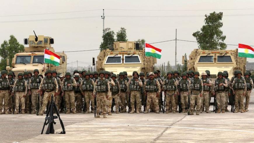 Kurdish Peshmerga fighters show their skills during a graduation ceremony on May 5, 2016 at the Kurdistan Training Coordination Center (KTTC) of Arbil, the capital of the autonomous Kurdish region of northern Iraq.
The KTTC is a joint effort of the Dutch, Italian, British and German governments which aims to unify the military assistance of these countries. / AFP / SAFIN HAMED        (Photo credit should read SAFIN HAMED/AFP/Getty Images)
