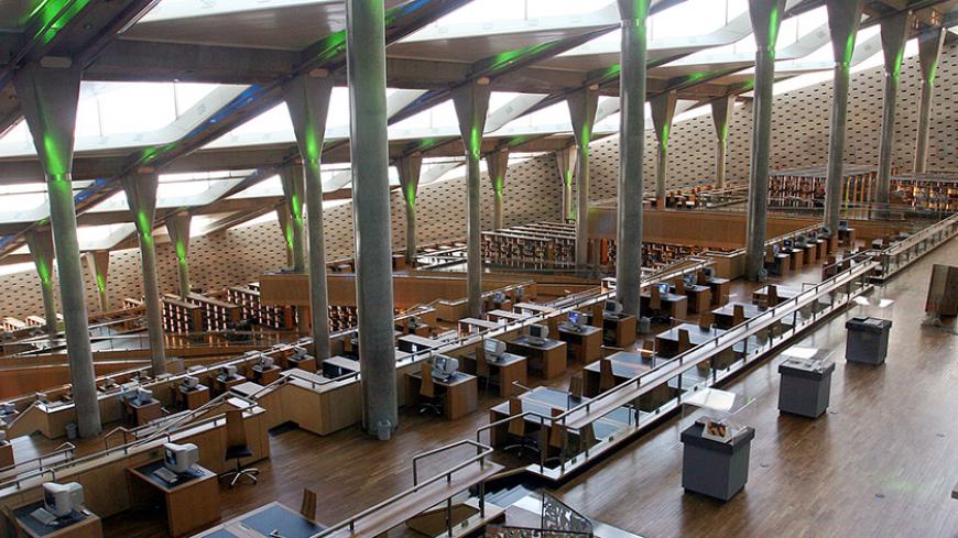 A view of the inner hall of the Bibliotheca Alexandrina March 28, 2005. The ultramodern, 11-storey disc-shaped structure standing on the Chatby Corniche in Alexandria evokes the legacy of the ancient Alexandria library and the Temple of the Muses, the Mouseion, where the Old Testament was translated into Greek from Hebrew for the first time. The institution and the city came to symbolise diversity, culture and learning, and it was the point at which cultures and civilisations met and flourished. Picture tak