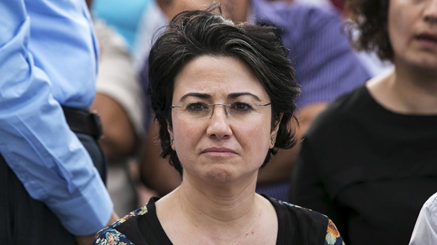 Hanin Zoabi, a legislator from the Joint Arab List, participates in a pro-Palestinian demonstration in the northern Israeli town of Sakhnin October 13, 2015. Israel's leading Arab politician was in the middle of a television interview on a street in its biggest Arab city when the mayor, also an Arab, pulled up in his car and started shouting at him to leave. With Palestinian knife attacks on the rise, the live TV encounter illustrated a conflict within Israel's Arab minority between sympathy for Palestinian