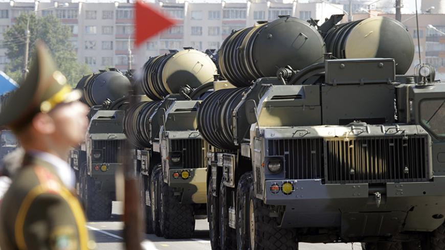 Belarusssian S-300 mobile missile launching systems drive through a military parade during celebrations marking Independence Day in Minsk July 3, 2013.  REUTERS/Vasily Fedosenko (BELARUS - Tags: MILITARY SOCIETY) - RTX11AYI