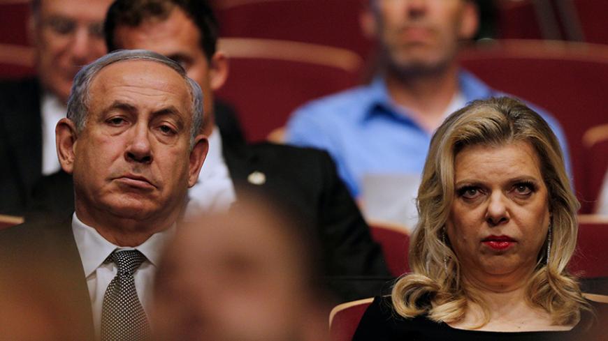 Israeli Prime Minister Benjamin Netanyahu (L) and his wife Sara (R) attend the the the 2016 Genesis Prize in Jerusalem, June 23, 2016. REUTERS/Amir Cohen - RTX2HV1J