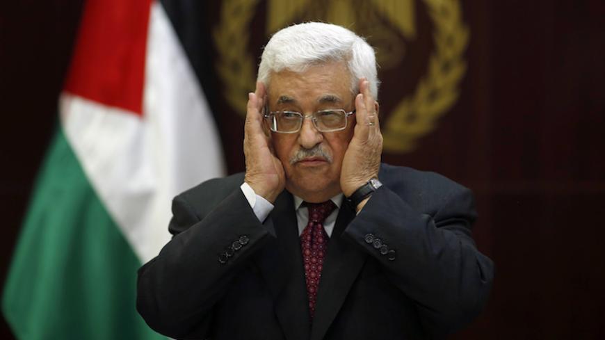 Palestinian President Mahmoud Abbas prays for Maysara Abu Hamdeya, a Palestinian inmate who died from cancer in an Israeli hospital on Tuesday, during a Fatah Central Committee meeting in the West Bank city of Ramallah April 2, 2013. Hamdeya's death threatened to raise tensions in the Israeli-occupied West Bank, where Palestinians, who view jailed brethren as heroes in a fight for statehood, have held several protests in recent weeks in support of prisoners. REUTERS/Mohamed Torokman (WEST BANK - Tags: POLIT