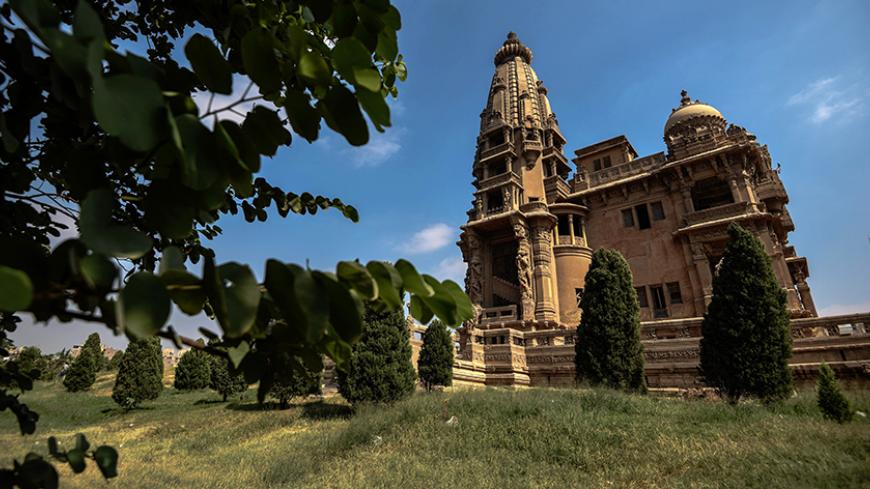 A picture taken on October 16, 2015 in Egyptian capital Cairo, shows the Baron Empain Palace, considered a unique architectural masterpiece and built by the Belgian industrialist, Baron Edouard Empain (1852-1929) who lived in Cairo and developed the East Cairo desert into the populated district known today as Heliopolis. The two-storey Cairo landmark, adorned with Hindu motives and figures, sitting on 2.5 hectares of prime real state land was completed in 1911. AFP PHOTO/ MOHAMED EL-SHAHED        (Photo cre