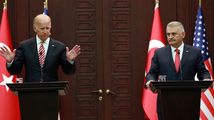 US Vice President Joe Biden (L) gestures next to Turkish Prime Minister Binali Yildirim (R) as they hold a joint press conference following their meeting on August 24, 2016 at the Cankaya Palace in Ankara.
US Vice President Joe Biden on August 24, 2016 said Washington had made clear that pro-Kurdish forces in Syria must not to cross west of the Euphrates River, a prospect alarming for Turkey. His comments come after Turkish troops launched an operation inside Syria to cleanse the key town of Jarabulus from 