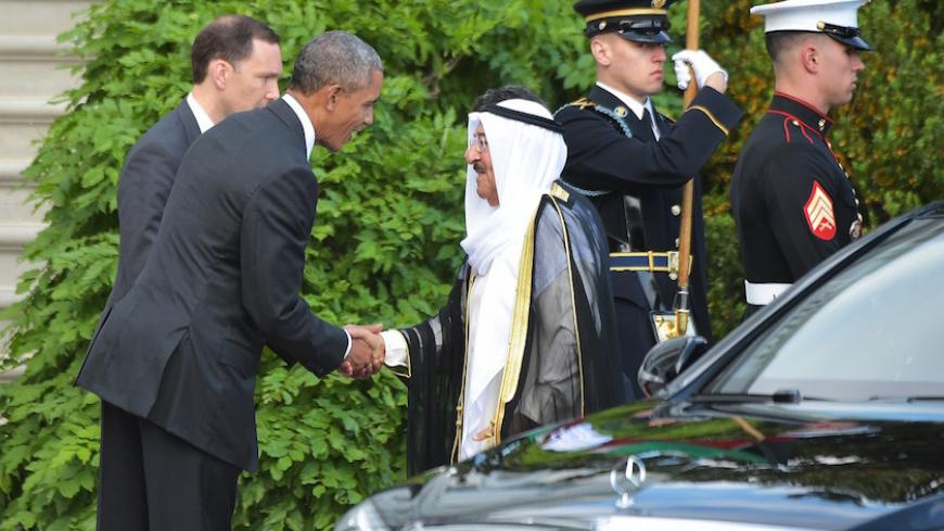 US President Barack Obama greets Kuwait's Emir Sheikh Sabah al-Ahmed al-Sabah on the South Lawn as he welcomes members of the Gulf Cooperation Council to the White House for a dinner on May 13, 2015 in Washington, DC. AFP PHOTO/MANDEL NGAN        (Photo credit should read MANDEL NGAN/AFP/Getty Images)