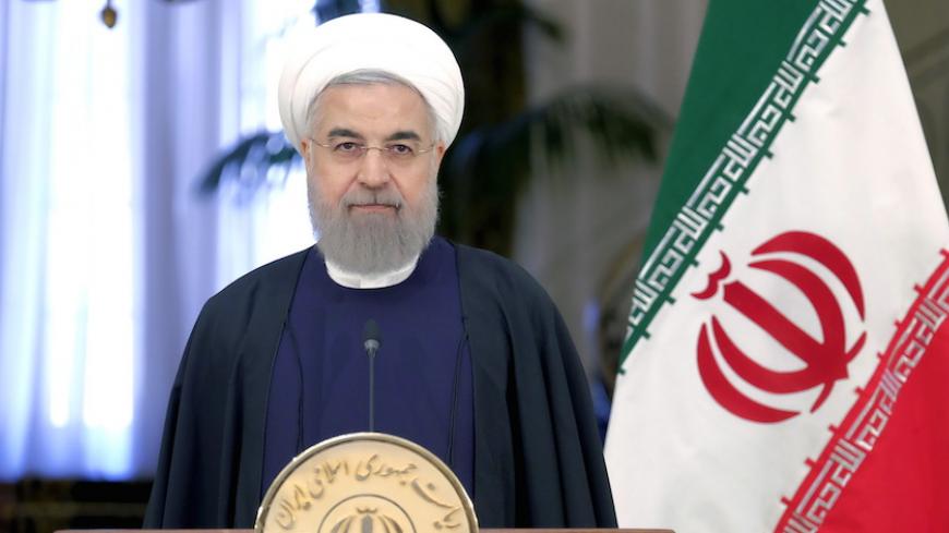 Iranian President Hassan Rouhani attend a news conference with Swiss President Johann Schneider-Ammann in Tehran February 27, 2016.REUTERS/Raheb Homavandi/TIMA  ATTENTION EDITORS - THIS IMAGE WAS PROVIDED BY A THIRD PARTY. FOR EDITORIAL USE ONLY. - RTS88J7