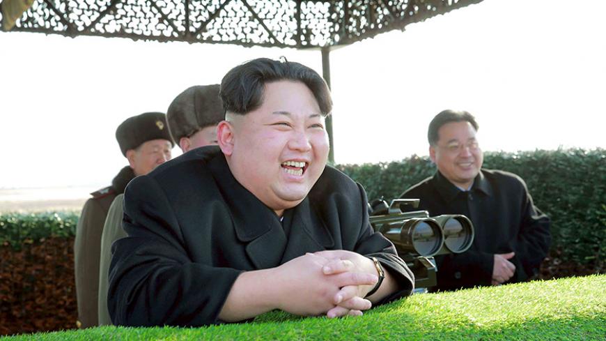 North Korean leader Kim Jong Un reacts during a test-fire of an anti-tank guided weapon in this undated photo released by North Korea's Korean Central News Agency (KCNA) in Pyongyang February 27, 2015.   REUTERS/KCNA    ATTENTION EDITORS - THIS PICTURE WAS PROVIDED BY A THIRD PARTY. REUTERS IS UNABLE TO INDEPENDENTLY VERIFY THE AUTHENTICITY, CONTENT, LOCATION OR DATE OF THIS IMAGE. FOR EDITORIAL USE ONLY. NOT FOR SALE FOR MARKETING OR ADVERTISING CAMPAIGNS. THIS PICTURE IS DISTRIBUTED EXACTLY AS RECEIVED BY
