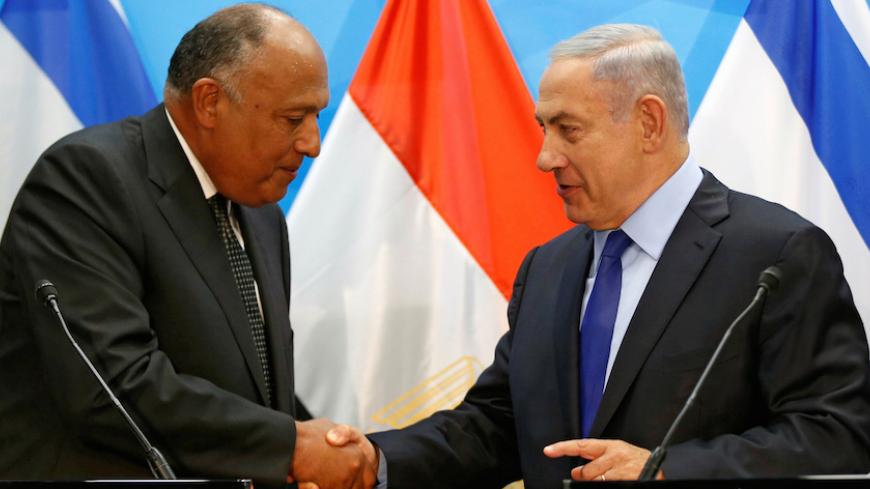 Israeli Prime Minister Benjamin Netanyahu meets Egypt's Foreign Minister Sameh Shoukry in Jerusalem July 10, 2016 REUTERS/Ronen Zvulun - RTSH5NC