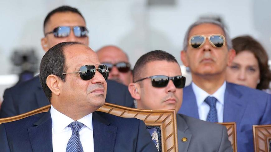 Egyptian President Abdel Fattah al-Sisi (L) attends during the first anniversary of launching the New Suez Canal and the 60th anniversary of nationalizing the Suez Canal in Ismailia, Egypt August 6, 2016 in this handout picture courtesy of the Egyptian Presidency. The Egyptian Presidency/Handout via REUTERS ATTENTION EDITORS - THIS IMAGE WAS PROVIDED BY A THIRD PARTY. EDITORIAL USE ONLY. - RTSLH8E