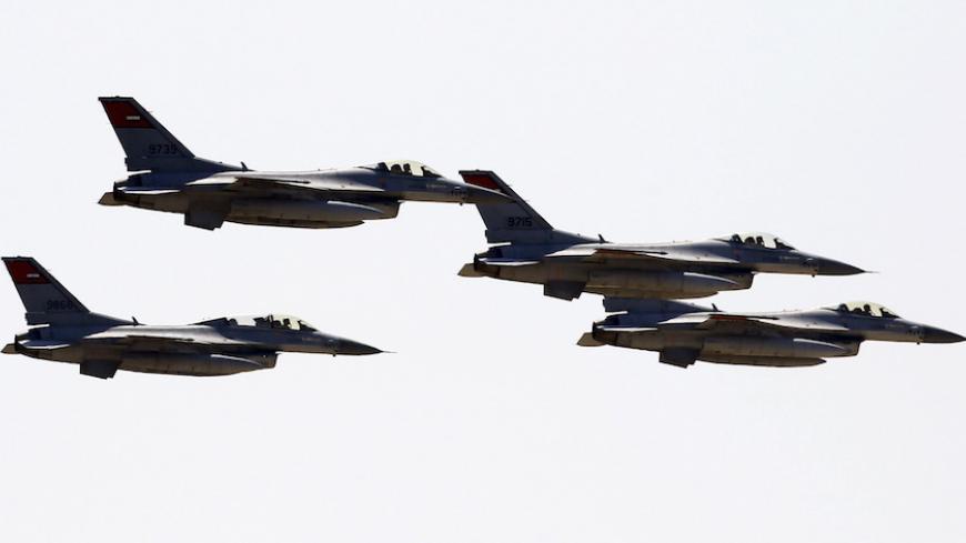 Egyptian air force planes parade during the inauguration ceremony of the new Suez Canal, in Ismailia, Egypt, August 6, 2015. Egypt staged a show of international support on Thursday as it inaugurated a major extension of the Suez Canal which President Abdel Fattah al-Sisi hopes will power an economic turnaround in the Arab world's most populous country. REUTERS/Amr Abdallah Dalsh - RTX1NCU2