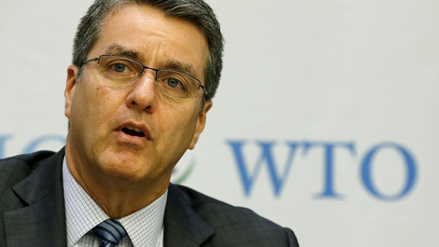 World Trade Organization (WTO) Director-General Roberto Azevedo attends a news conference on the launch of the World Trade Report 2015 in Geneva, Switzerland, October 26, 2015. The benefits of a treaty that will cut red tape at borders and standardise customs procedures are much larger than previously thought and could add $3.6 trillion to annual global exports, the World Trade Organization (WTO) said in a report on Monday. REUTERS/Denis Balibouse   - RTX1T975