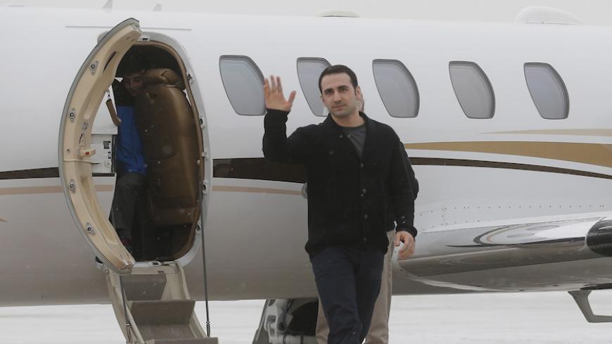 Former U.S. Marine Amir Hekmati, recently released from an Iranian prison, arrives at an airport in Flint, Michigan January 21, 2016.      REUTERS/Rebecca Cook      TPX IMAGES OF THE DAY      - RTX23GED