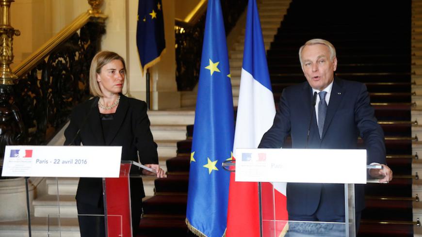 European Union foreign policy chief Federica Mogherini (L) and French Foreign Minister Jean-Marc Ayrault attend a news conference in Paris, France, April 22, 2016. REUTERS/Jacky Naegelen - RTX2B772