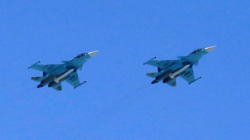 Russian Sukhoi Su-34 fighter-bombers fly in formation during the Victory Day parade, marking the 71st anniversary of the victory over Nazi Germany in World War Two, above Red Square in Moscow, Russia, May 9, 2016. REUTERS/Maxim Shemetov - RTX2DM3X