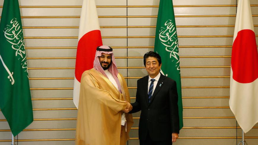 Saudi Deputy Crown Prince Mohammad bin Salman (L) meets with Japan's Prime Minister Shinzo Abe at Abe's official residence in Tokyo, Japan September 1, 2016. REUTERS/Issei Kato - RTX2NR86