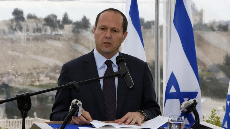 Backdropped by Jerusalem's Old City Ottoman walls, Jerusalem's mayor Nir Barkat speaks during a joint press conference with Israeli Prime Minister Benjamin Netanyahu (unseen) on February 23, 2015, a day after Barkat and his bodyguard apprehended a young Palestinian who stabbed an ultra-Orthodox Jew in Jerusalem.  AFP PHOTO / GALI TIBBON        (Photo credit should read GALI TIBBON/AFP/Getty Images)