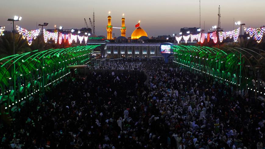 Shiite Muslim pilgrims gather in front of the shrine of Imam Hussein, a grandson of the Prophet Mohammed, on Arafah day, referring to a prayer performed by Shiites in Saudi Arabia's Arafat plain on the second day of hajj, on September 11, 2016 in the holy city of Karbala, 80 kilometres south of the capital Baghdad. 
Barred from Mecca amid an escalating spat between Tehran and Saudi Arabia, masses of Iranian Shiite faithful have converged on the holy Iraqi city of Karbala for an alternative pilgrimage. The r