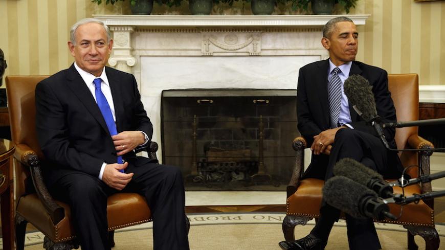U.S. President Barack Obama meets with Israeli Prime Minister Benjamin Netanyahu in the Oval office of the White House in Washington November 9, 2015. The two leaders meet here today for the first time since the Israeli leader lost his battle against the Iran nuclear deal, with Washington seeking his re-commitment to a two-state solution with the Palestinians. REUTERS/Kevin Lamarque  - RTS66FF