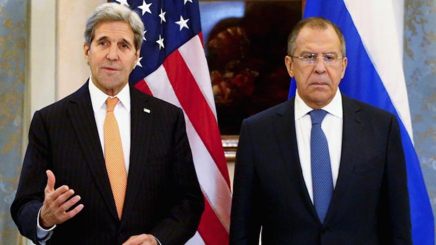 Russia's Foreign Minister Sergei Lavrov (R) and U.S. Secretary of State John Kerry address the media before a meeting in Vienna, Austria, November 14, 2015. World and regional powers, including officials from Iran, Russia, Saudi Arabia, Turkey and Europe are meeting in Vienna on Saturday in a bid to step up diplomatic efforts to end the four-year old conflict in Syria.   REUTERS/Leonhard Foeger      TPX IMAGES OF THE DAY      - RTS6Z3L