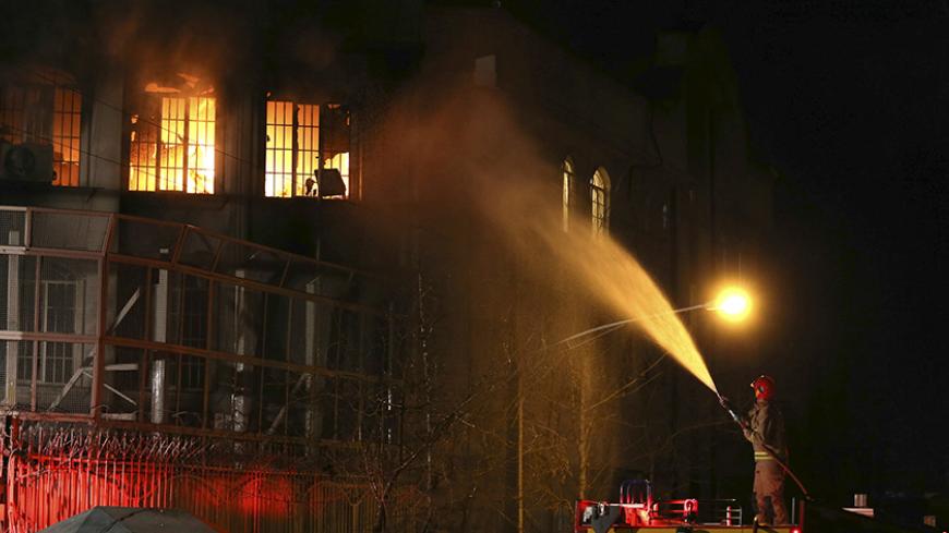 Flames rise from Saudi Arabia's embassy after it was stormed by Iranian protesters during a demonstration in Tehran, Iran, January 2, 2016.  REUTERS/TIMA/Mehdi Ghasemi/ISNA/File Photo ATTENTION EDITORS - THIS PICTURE WAS PROVIDED BY A THIRD PARTY. REUTERS IS UNABLE TO INDEPENDENTLY VERIFY THE AUTHENTICITY, CONTENT, LOCATION OR DATE OF THIS IMAGE. FOR EDITORIAL USE ONLY. NOT FOR SALE FOR MARKETING OR ADVERTISING CAMPAIGNS. NO THIRD PARTY SALES. NOT FOR USE BY REUTERS THIRD PARTY DISTRIBUTORS. THIS PICTURE IS