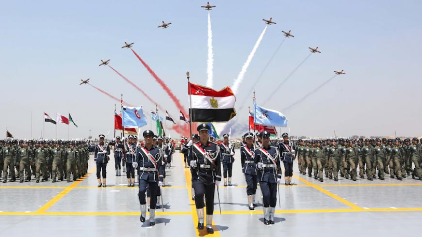 Egyptian students and the Air Force Academy graduates attend during the graduation of 83 aviation and military science at the Air Force Academy in Cairo, Egypt July 20, 2016 in this handout picture courtesy of the Egyptian Presidency. The Egyptian Presidency/Handout via REUTERS ATTENTION EDITORS - THIS IMAGE WAS PROVIDED BY A THIRD PARTY. EDITORIAL USE ONLY. - RTSIXER
