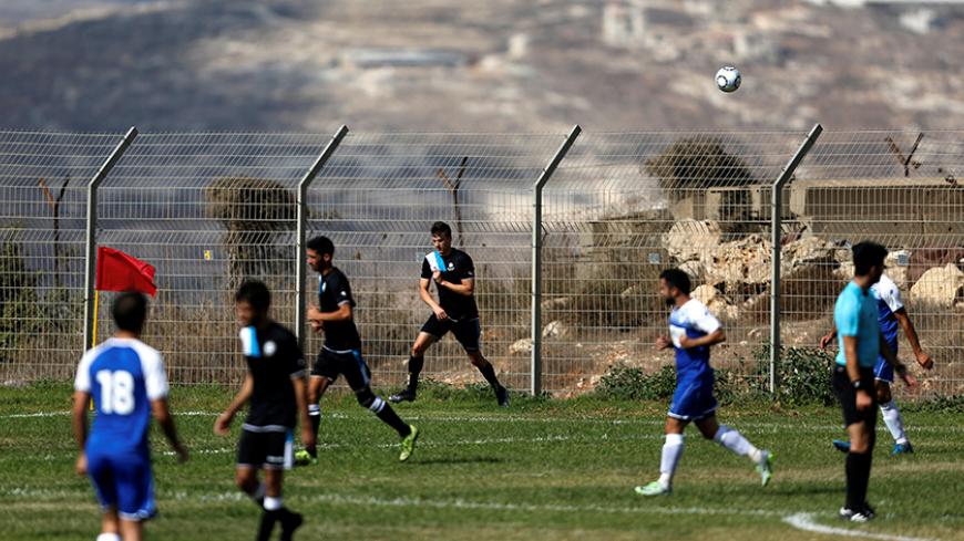 Players from Israeli soccer clubs affiliated with Israel Football Association, Ariel Municipal Soccer Club and Maccabi HaSharon Netanya, play against each other at Ariel Municipal Soccer Club's training grounds in the West Bank Jewish settlement of Ariel September 23, 2016. Picture taken September 23, 2016. REUTERS/Amir Cohen  - RTSPDV4