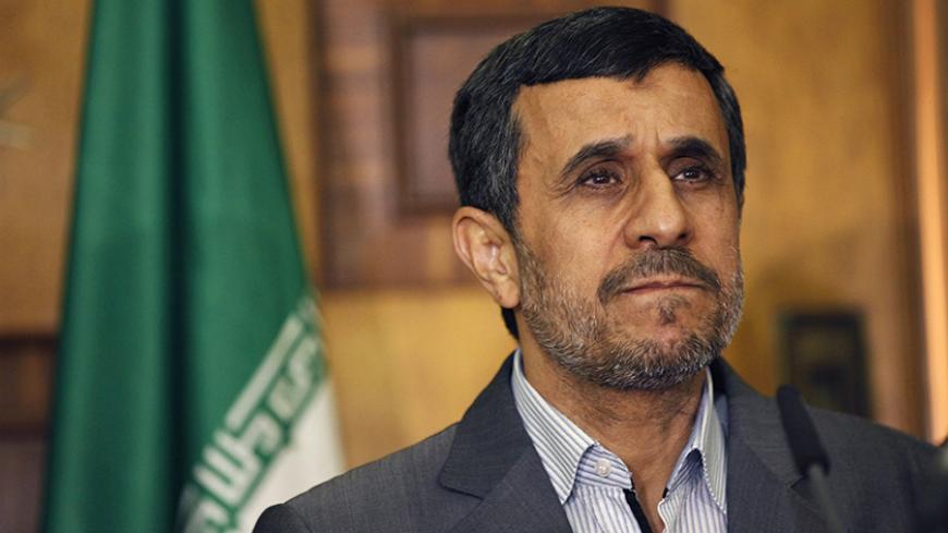 Iran's President Mahmoud Ahmadinejad meets with Iraq's Vice President Khudair al-Khuzaie (not seen) during his visit in Baghdad July 18, 2013. REUTERS/Hadi Mizban/Pool (IRAQ - Tags: POLITICS HEADSHOT PROFILE) - RTX11QT4