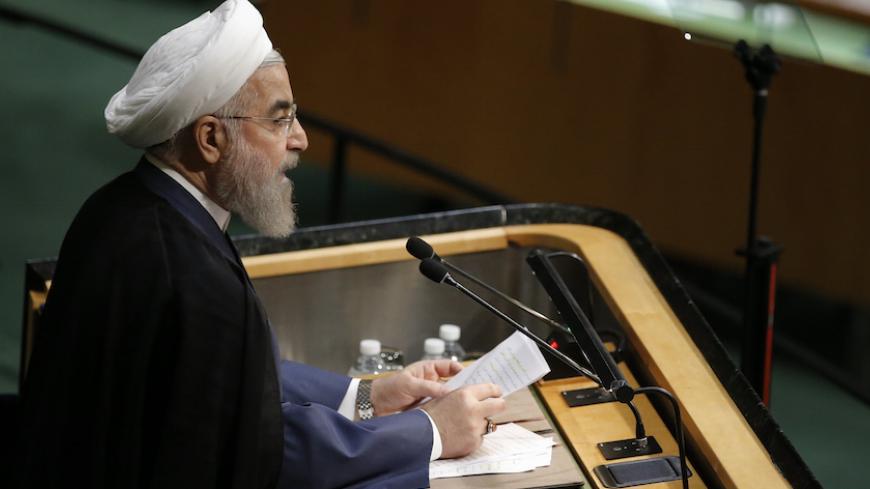 Iranian President Hassan Rouhani addresses attendees during the 70th session of the United Nations General Assembly at the U.N. headquarters in New York, September 28, 2015.   REUTERS/Carlo Allegri - RTX1SX6L